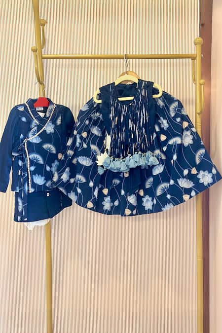 Rage Attire-Sweta Saria_Blue Cotton Tassels Floral Print Lehenga And Blouse Set _at_Aza_Fashions