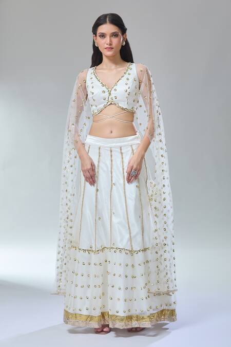 Buy_Divya Kanakia_Ivory Net, Silk Satin Sequins, Embroidery V-neck Lehenga And Blouse Set _Online_at_Aza_Fashions