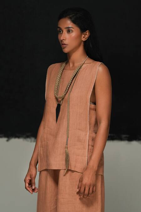 Urvashi Kaur_Orange Linen Round Neck Yuragi Handwoven Top _Online_at_Aza_Fashions