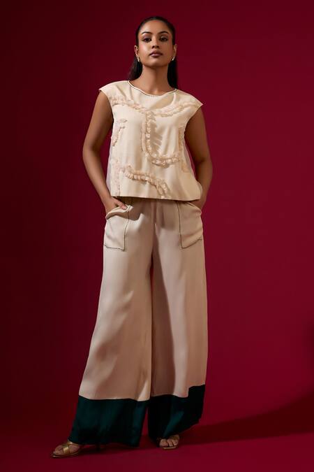 Omana By Ranjana Bothra_Ivory Satin, Organza Ruffles Round Neck Designer Top And Trouser Set _at_Aza_Fashions