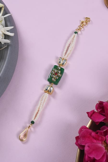 Shlok Jewels Jadau Kundan Rakhi with Gemstones 