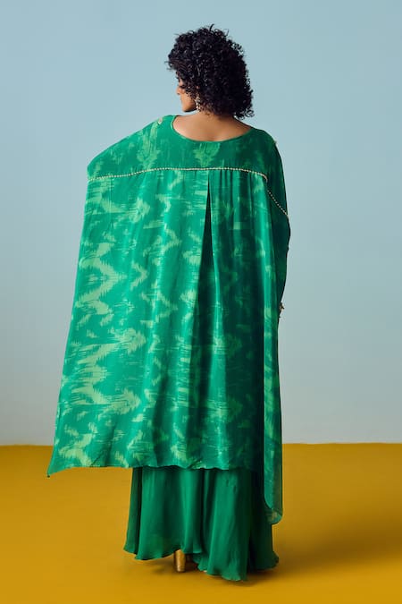Shop Prahnaaya Green Crepe Embroidery, Beads Round Neck Sea Hi-low Top And Flared Palazzo Set at Aza Fashions Shop_Prahnaaya_Green Crepe Embroidery, Beads Round Neck Sea Hi-low Top And Flared Palazzo Set _at_Aza_Fashions