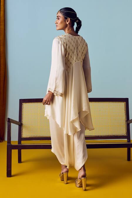 Buy Prahnaaya White Satin, Silk Beads, Pearls, Sequins Asymmetric Flared Tunic And Skirt Set Online at Aza Fashions Buy_Prahnaaya_White Satin, Silk Beads, Pearls, Sequins Asymmetric Flared Tunic And Skirt Set _Online_at_Aza_Fashions