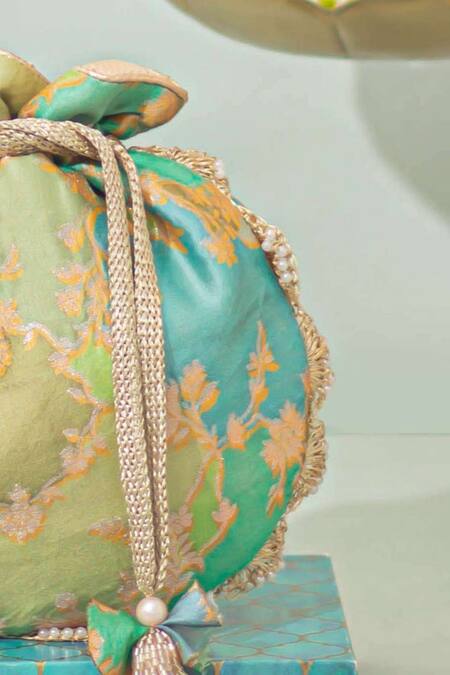 Amyra_Green Pearls, Tassels Abstract Art Banarasi Potli_Online_at_Aza_Fashions