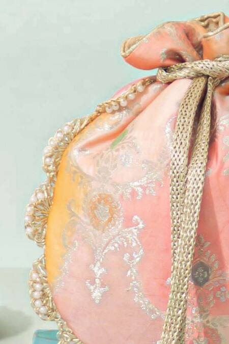 Buy_Amyra_Peach Pearls, Beads Abstract Art Banarasi Potli _Online_at_Aza_Fashions