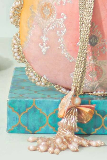 Shop_Amyra_Peach Pearls, Beads Abstract Art Banarasi Potli _Online_at_Aza_Fashions