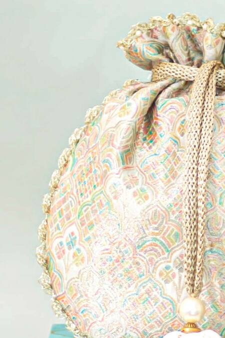 Buy_Amyra_Multi Color Tassels, Pearls Chakori Pure Banarasi Silk Potli _Online_at_Aza_Fashions