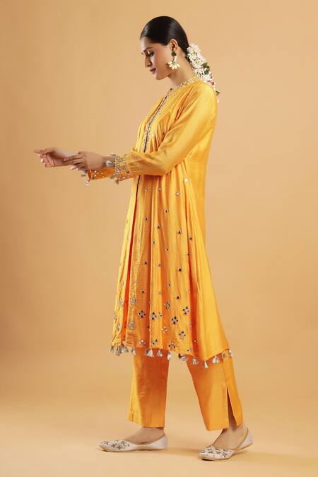 Bha Sha_Yellow Silk, Net Embroidery, Mirrors Round Neck Marigold Work Kurta Set _at_Aza_Fashions