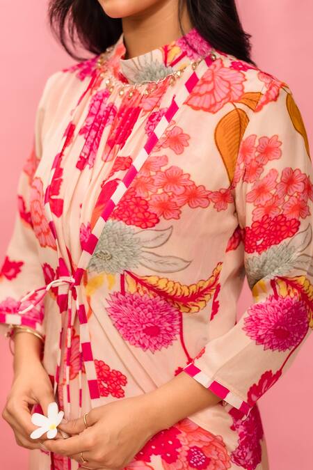 Shop Meher By Islie Pink Crepe Tassels High Neck Printed Designer Jumpsuit Online at Aza Fashions Shop_Meher By Islie_Pink Crepe Tassels High Neck Printed Designer Jumpsuit _Online_at_Aza_Fashions