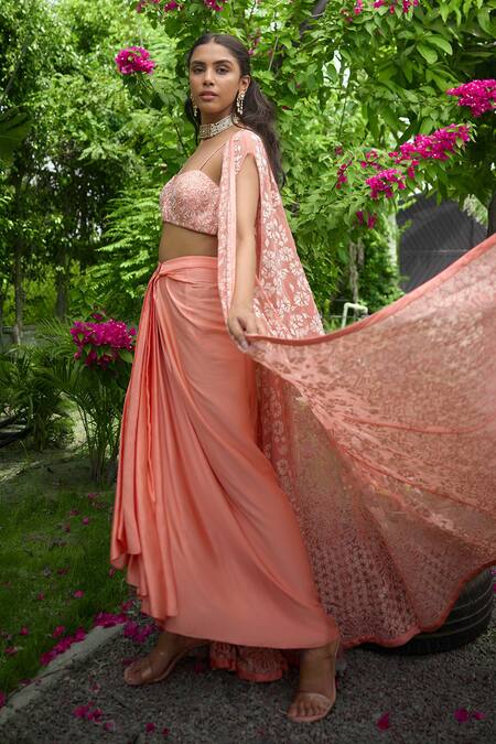 SHASHA GABA Peach Satin, Net Embroidery Open , Sweetheart Cape And Dhoti Skirt Set at Aza Fashions SHASHA GABA_Peach Satin, Net Embroidery Open , Sweetheart Cape And Dhoti Skirt Set _at_Aza_Fashions