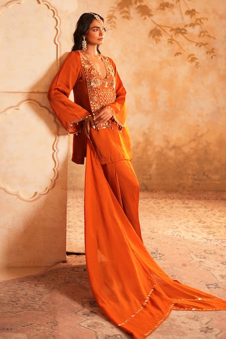 Buy_Kiran Kalsi_Rust Satin, Organza Tassels, Embroidery V-neck Orange Hand Kurta Set _Online_at_Aza_Fashions