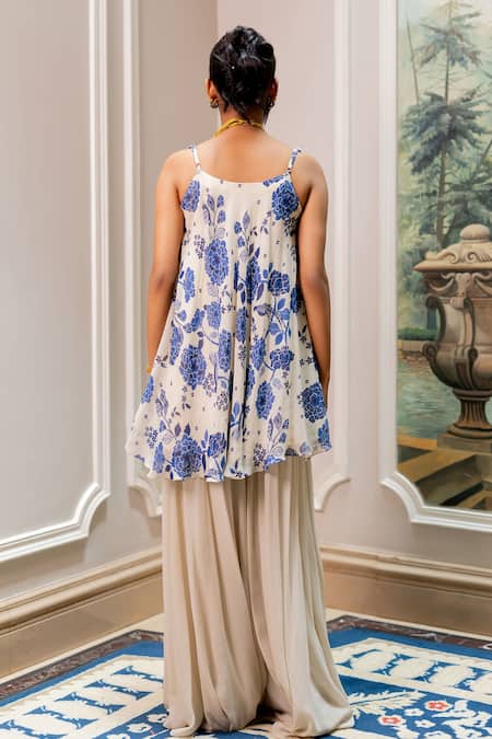 Shop Paulmi And Harsh Blue Georgette Embroidery, Sequins Round Neck Floral Tunic And Palazzo Set at Aza Fashions Shop_Paulmi And Harsh_Blue Georgette Embroidery, Sequins Round Neck Floral Tunic And Palazzo Set _at_Aza_Fashions