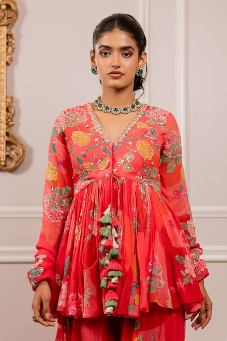 Paulmi And Harsh_Pink Georgette Tassels V-neck Floral Printed Peplum Tunic And Palazzo Set _at_Aza_Fashions