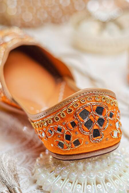 Shop_NR By Nidhi Rathi_Orange Embroidered Flat Juttis _Online_at_Aza_Fashions