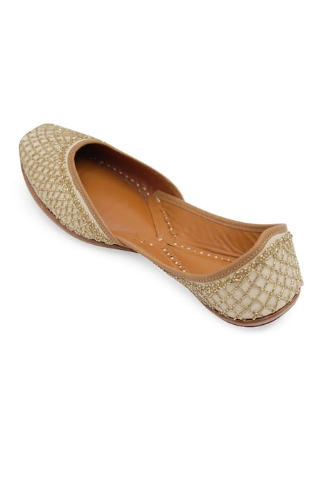 Buy_NR By Nidhi Rathi_Gold Gold-toned Leather Embroidered Juttis _Online_at_Aza_Fashions