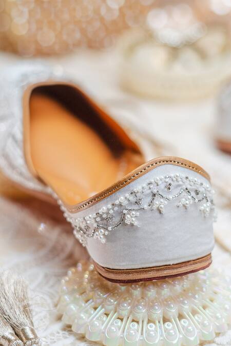 Shop_NR By Nidhi Rathi_White Handcrafted Embroidered Leather Juttis _Online_at_Aza_Fashions