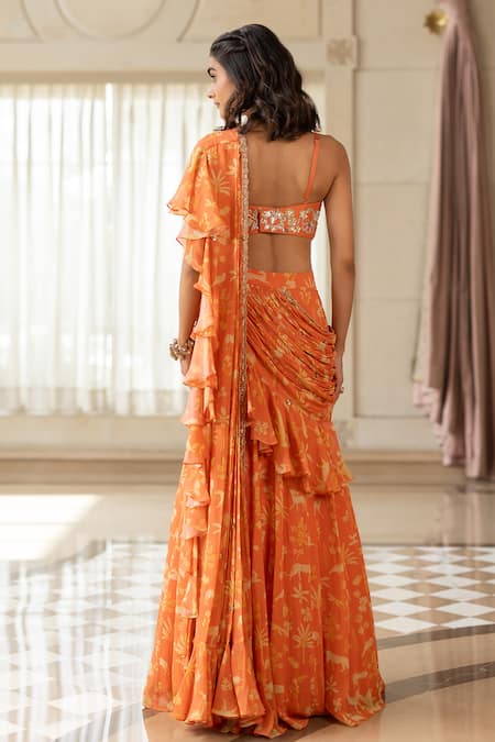 Paulmi And Harsh Orange Georgette Pre-draped Saree Set 