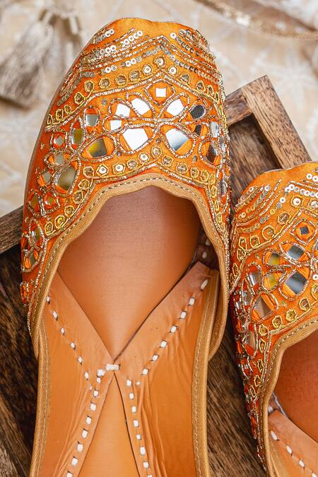 Shop_NR By Nidhi Rathi_Orange Embroidered Flat Juttis 