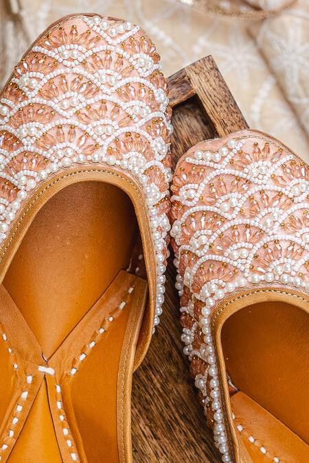 Shop_NR By Nidhi Rathi_Rose Gold Embroidered Flat Juttis 