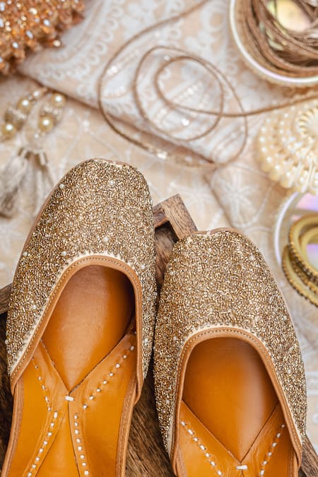 Shop_NR By Nidhi Rathi_Gold Embellished Ethnic Flat Juttis 