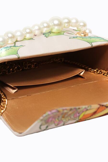 NR By Nidhi Rathi Pink Pearls Desi Girl Printed Foldover Clutch at Aza Fashions NR By Nidhi Rathi_Pink Pearls Desi Girl Printed Foldover Clutch _at_Aza_Fashions