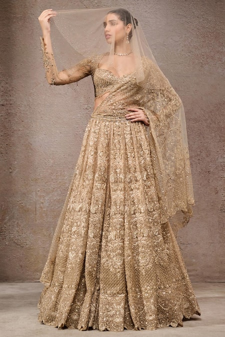 Tarun Tahiliani_Gold Tulle, Net Sequins, Embroidery Sweetheart Neck Lehenga Set _at_Aza_Fashions