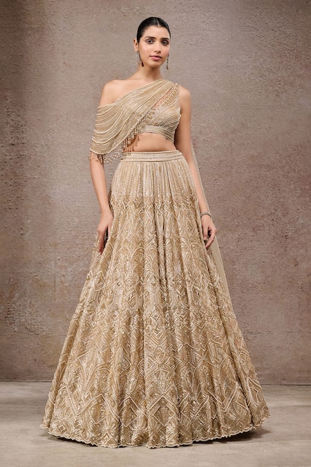 Tarun Tahiliani_Gold Tulle, Net Sequins, Beads Off-shoulder Embroidered Lehenga Set _at_Aza_Fashions