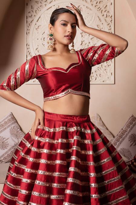 Pomcha Jaipur_Red Taffeta, Silk, Net Gota Patti, Tassels Sweetheart Neck Lehenga Set _Online_at_Aza_Fashions