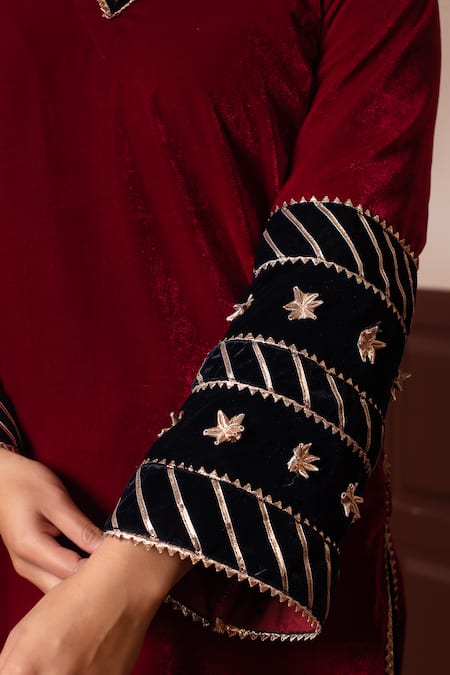 Pomcha Jaipur_Maroon Velvet Gota Patti, Embroidery V-neck Kurta Pant Set _at_Aza_Fashions