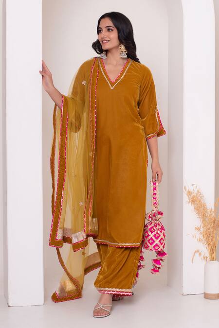 Pomcha Jaipur_Mustard Velvet, Net Gota Patti V-neck Kurta Pant Set _Online_at_Aza_Fashions