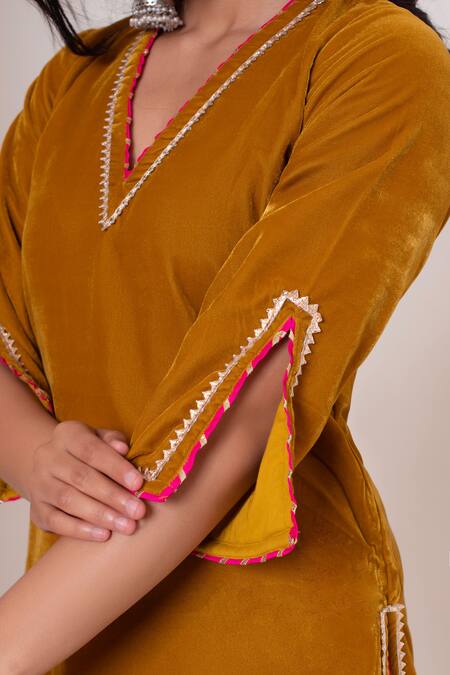 Shop_Pomcha Jaipur_Mustard Velvet, Net Gota Patti V-neck Kurta Pant Set _Online_at_Aza_Fashions