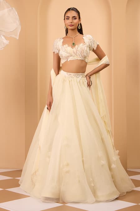 One Knot One By Ashna Ivory Organza Fabric Flowers, Sequins Sweetheart Neck Lehenga Set 