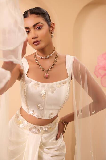 Buy_One Knot One By Ashna_Ivory Silk, Net Fabric Flowers Square Neck Shimmer Corset And Drape Skirt Set _Online_at_Aza_Fashions