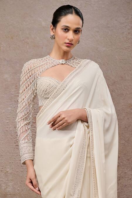 Tarun Tahiliani_Ivory Georgette Sequins Designer Saree With Unstitched Blouse Piece _Online_at_Aza_Fashions