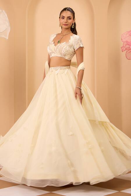 One Knot One By Ashna_Ivory Organza Fabric Flowers, Sequins Sweetheart Neck Lehenga Set _at_Aza_Fashions