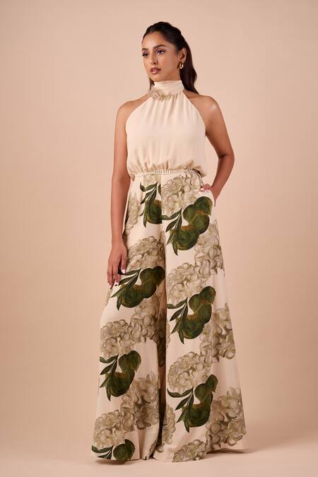 Shriya Som_Multi Color Crepe Beads Halter Neck Hydrangea Print Jumpsuit _Online_at_Aza_Fashions