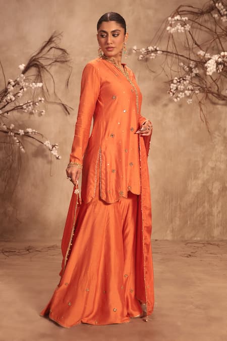 Shop Label Niti Bothra Orange Silk Mirrors, Tassels Round Neck Embroidered Sharara Set Online at Aza Fashions Shop_Label Niti Bothra_Orange Silk Mirrors, Tassels Round Neck Embroidered Sharara Set _Online_at_Aza_Fashions