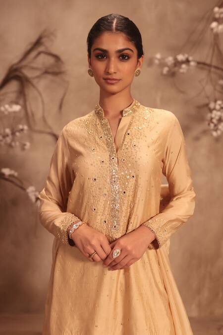 Label Niti Bothra Ivory Silk Tassels Mandarin Collar Embroidered Sharara Set at Aza Fashions Label Niti Bothra_Ivory Silk Tassels Mandarin Collar Embroidered Sharara Set _at_Aza_Fashions