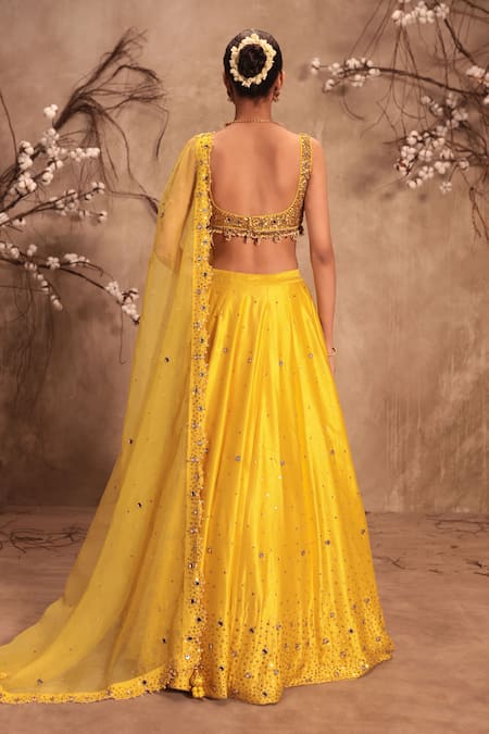 Label Niti Bothra Heavy Embroidered Yellow Lehenga Set 