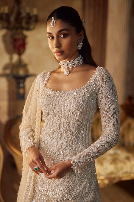 Buy_Seema Gujral_Ivory Net Embroidery, Pearls, Sequins, Crystals, Tassels Vinatge Lehenga Set _Online_at_Aza_Fashions