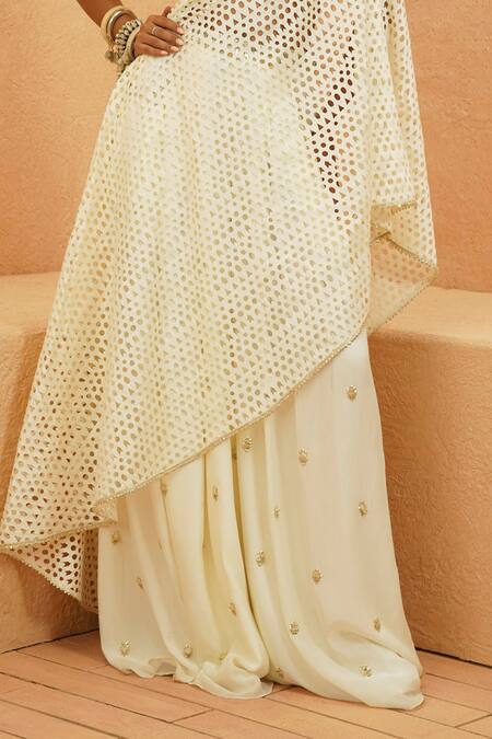 Sva By Sonam & Paras Modi_Ivory Silk Cut Work, Sequins Off-shoulder Cutwork Top And Embellished Pant Set_Online_at_Aza_Fashions