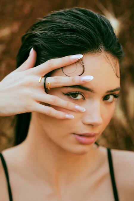 Shop_Varnika Arora_Gold Plated Twistie 2-way Black Enamel Ring _Online_at_Aza_Fashions