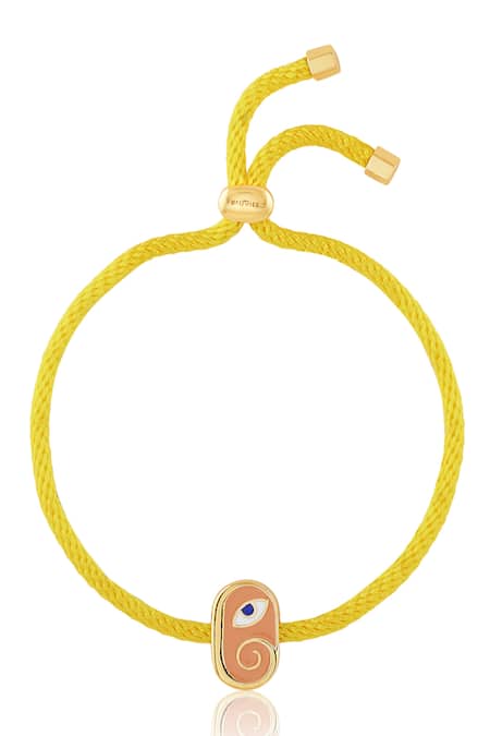 Shop Isharya Yellow Embroidery Ganesha Rakhi Bracelet at Aza Fashions Shop_Isharya_Yellow Embroidery Ganesha Rakhi Bracelet _at_Aza_Fashions