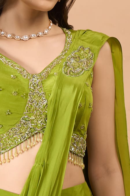 Shop Aariyana Couture Green Crepe Sequins, Beads, Embroidery V-neck Pre-draped Saree With Blouse Online at Aza Fashions Shop_Aariyana Couture_Green Crepe Sequins, Beads, Embroidery V-neck Pre-draped Saree With Blouse _Online_at_Aza_Fashions