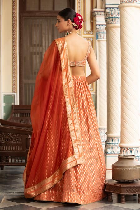 Neha Khullar Rust Orange Zardozi Mirror Work Lehenga Set 