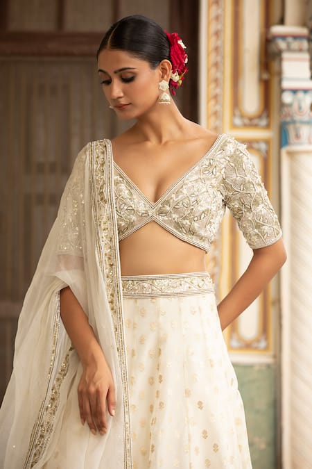 Neha Khullar Ivory Silk Mirrors, Zari V-neck Zardozi Work Lehenga Set Online at Aza Fashions Neha Khullar_Ivory Silk Mirrors, Zari V-neck Zardozi Work Lehenga Set _Online_at_Aza_Fashions