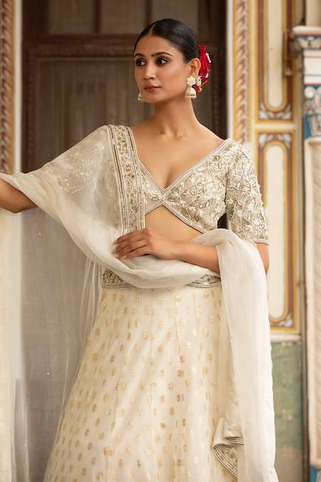 Buy Neha Khullar Ivory Silk Mirrors, Zari V-neck Zardozi Work Lehenga Set Online at Aza Fashions Buy_Neha Khullar_Ivory Silk Mirrors, Zari V-neck Zardozi Work Lehenga Set _Online_at_Aza_Fashions