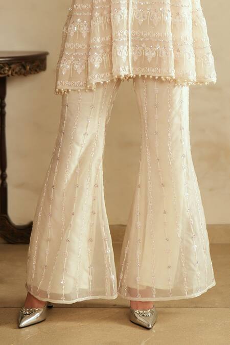 Saisha_Ivory Organza Sequins, Beads, Embroidery Round Neck Tunic And Bell Bottom Pant Set _at_Aza_Fashions