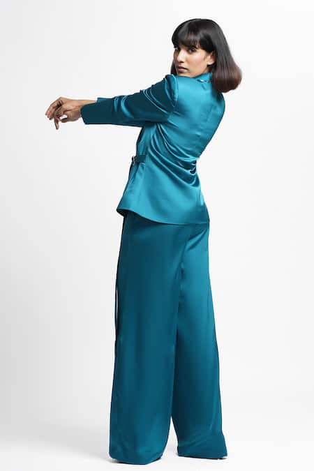 Shop Ahi Clothing X AZA Teal Satin, Crepe Quinn Embellished Wrap Buckle Cort And Pant Set at Aza Fashions Shop_Ahi Clothing X AZA_Teal Satin, Crepe Quinn Embellished Wrap Buckle Cort And Pant Set _at_Aza_Fashions