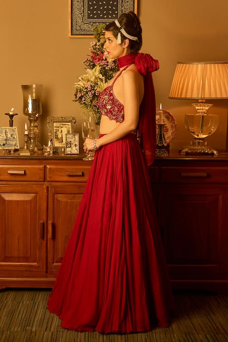 Krishna Padia Maroon Crepe, Organza Embroidery Halter Neck Hand Lehenga Set at Aza Fashions Krishna Padia_Maroon Crepe, Organza Embroidery Halter Neck Hand Lehenga Set _at_Aza_Fashions